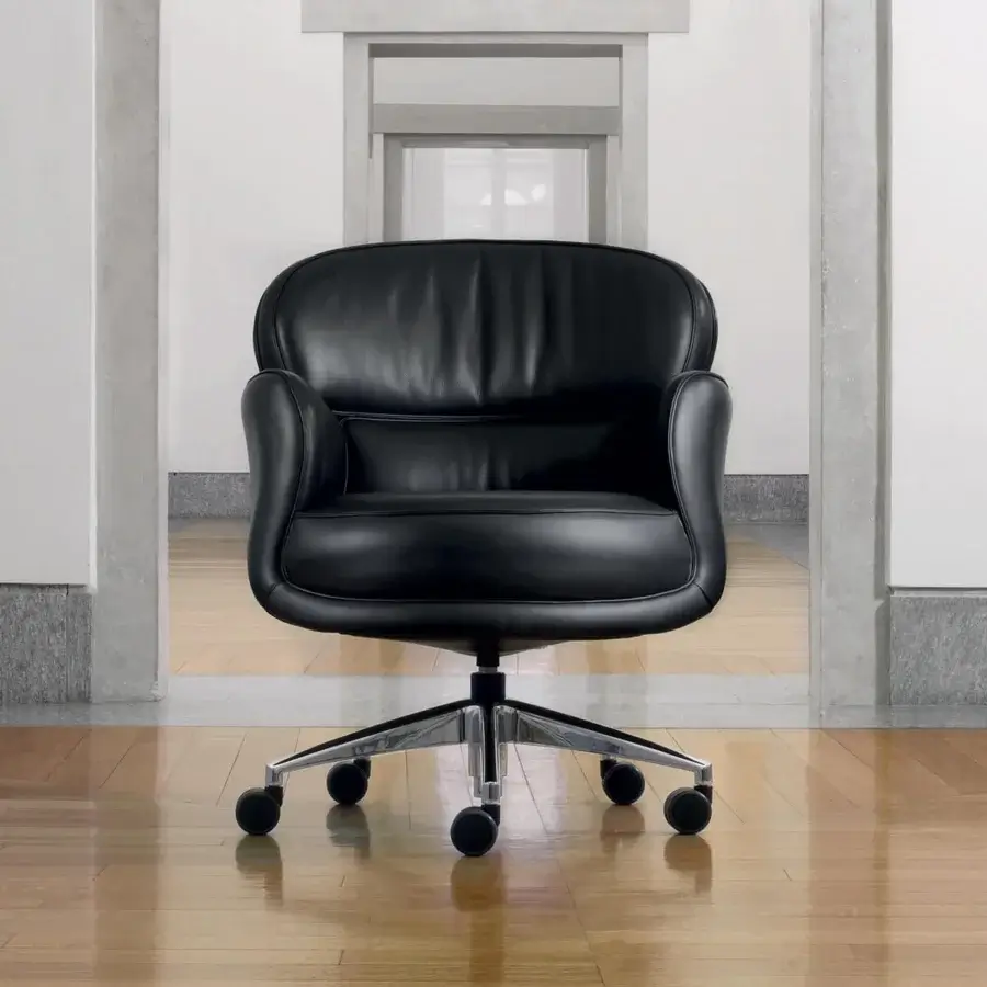 Elegant Mascheroni Utopias armchair crafted in black leather with a glossy finish and polished steel base