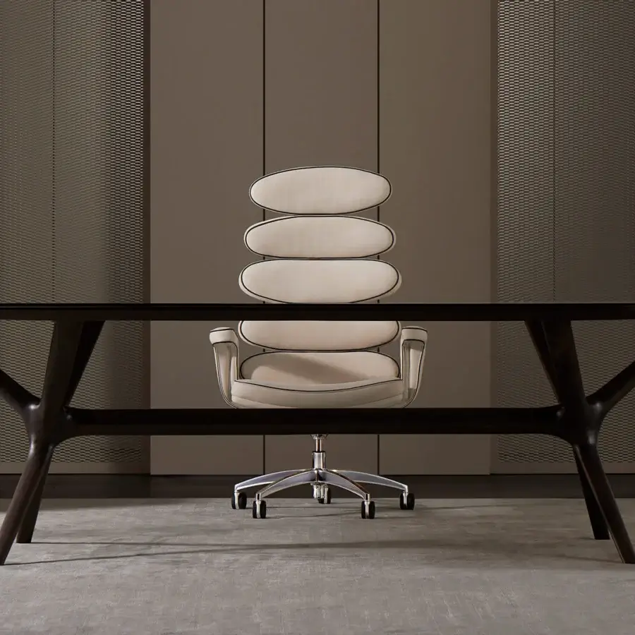 Exceptional Mascheroni Airone armchair upholstered in light cream textile with black trim and shiny swivel base crafted with birch shaped wood and steel