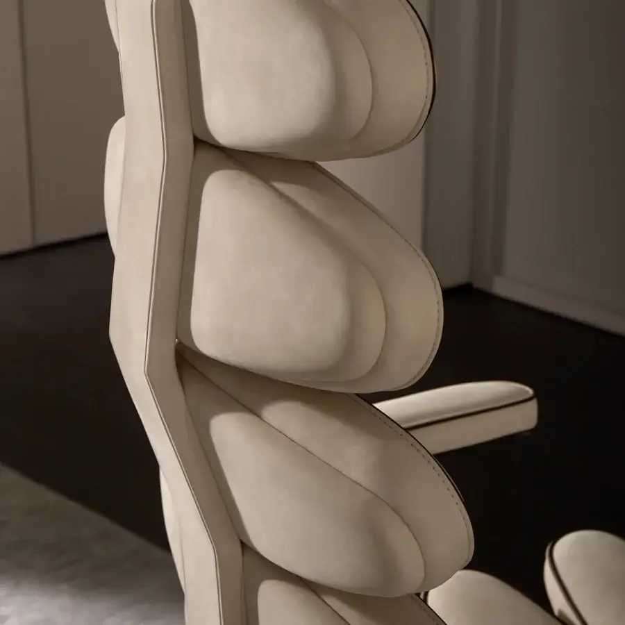 Distinguished Mascheroni Airone armchair crafted with light beige textile upholstery, a curved backrest and swivel castor base built in Italy
