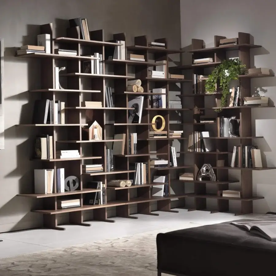 Elegant Pacini & Cappellini bookcase built with wood, displaying an asymmetrical arrangement and warm medium-toned brown finish