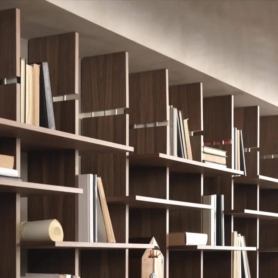 Distinguished Pacini & Cappellini bookcase crafted in wood with a matte finish, presenting an asymmetrical geometric design for versatile display