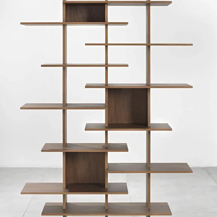 Distinctive Pacini & Cappellini bookcase with asymmetrical shelving and warm medium brown wood construction in a smooth matte finish