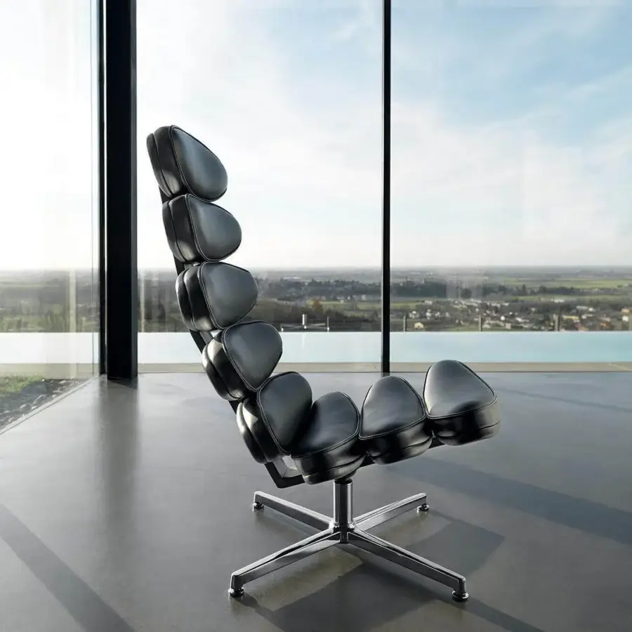 Distinctive Mascheroni Airone lounge chair crafted with smooth black natural leather upholstery and glossy metal base