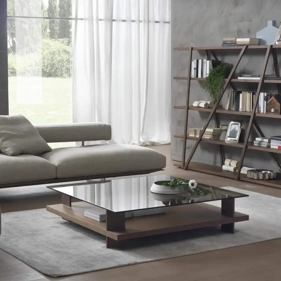 Distinguished Pacini & Cappellini Corallo coffee table with a tempered glass top and veneered ash lower shelf in medium-brown finish