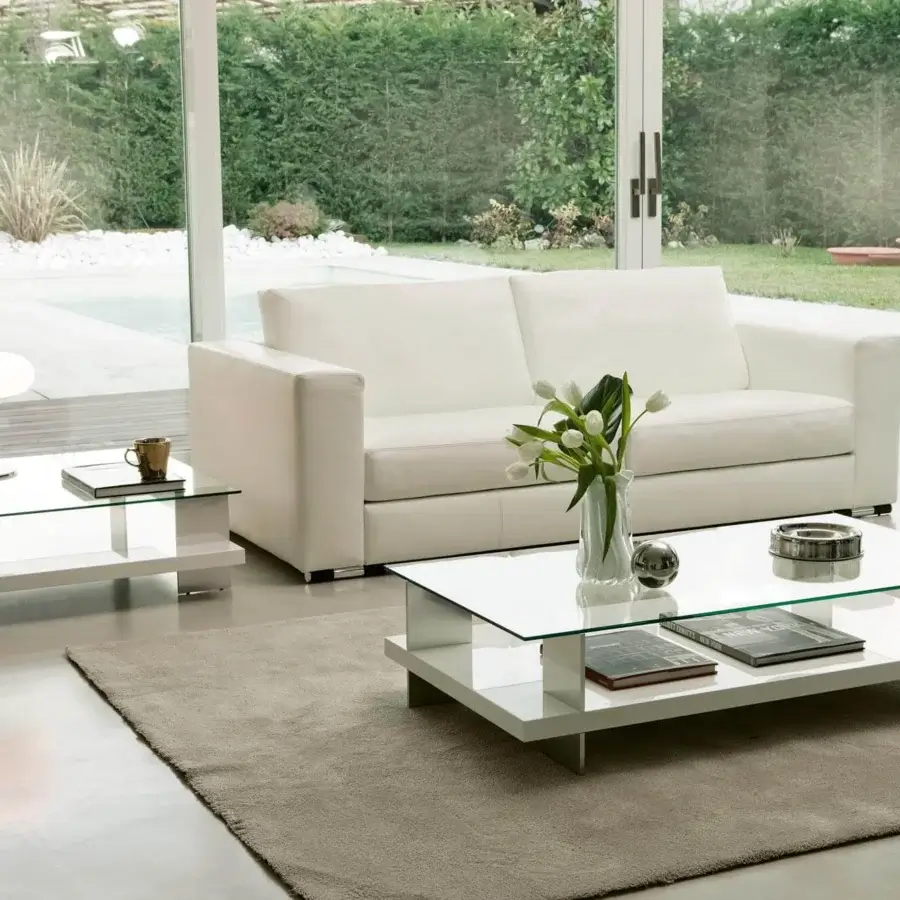 Exclusive Pacini & Cappellini Corallo coffee table with tempered glass and glossy white lacquered wood lower shelf