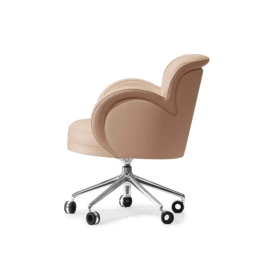 Distinguished Mascheroni Petali armchair crafted with light tan synthetic leather upholstery and polished metal five-legged base