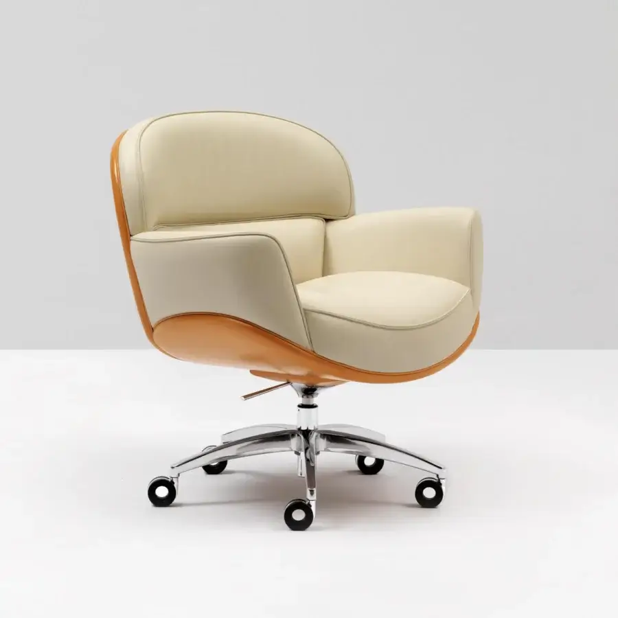 Exceptional Mascheroni Perfecta armchair with creamy upholstery and tan outer frame exhibiting gleaming metal components