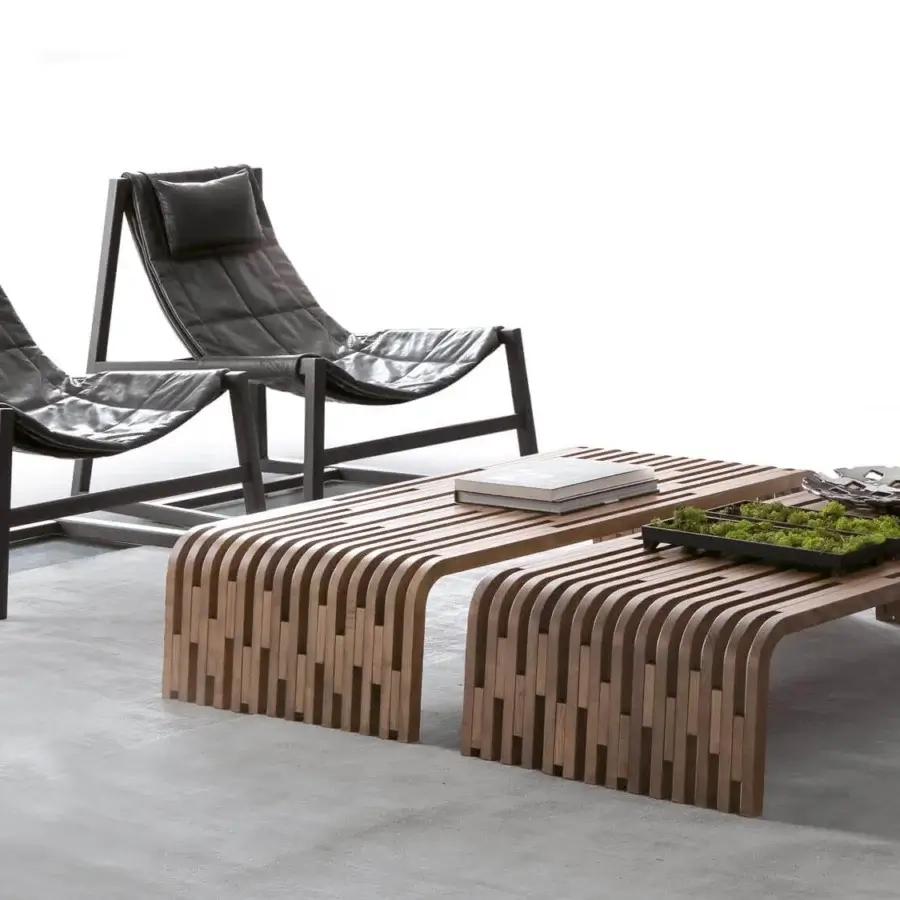 Elegant Pacini & Cappellini Millerighe coffee table with a smooth matte medium-brown solid wood and artful curved block board crafting