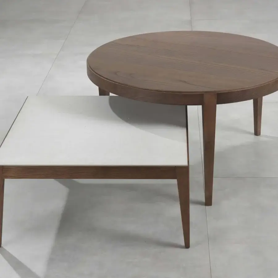 Superior Pacini & Cappellini Dominique coffee table with a round wood top and three slender wooden legs in a matte finish
