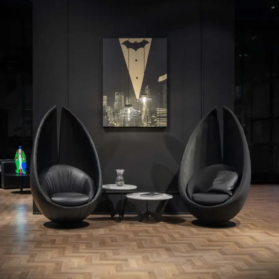 Distinguished CONTROVENTO WAYNE Enterprises WE-003H lounge chair with black leather upholstery and glossy metal swivel base