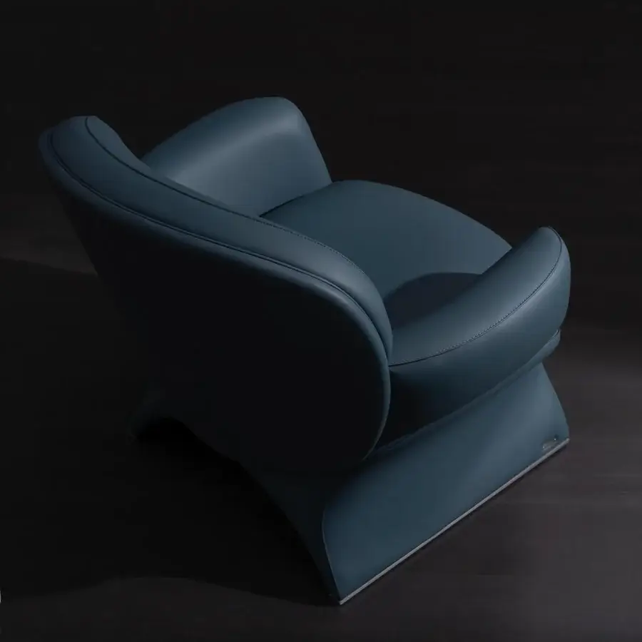 Superior Mascheroni La Goccia lounge chair upholstered in smooth matte blue material with metallic trim