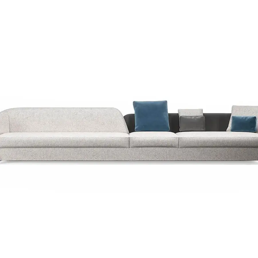 Exceptional Reflex Stratum sectional with light gray speckled fabric, dark gray synthetic accents and included blue cushions