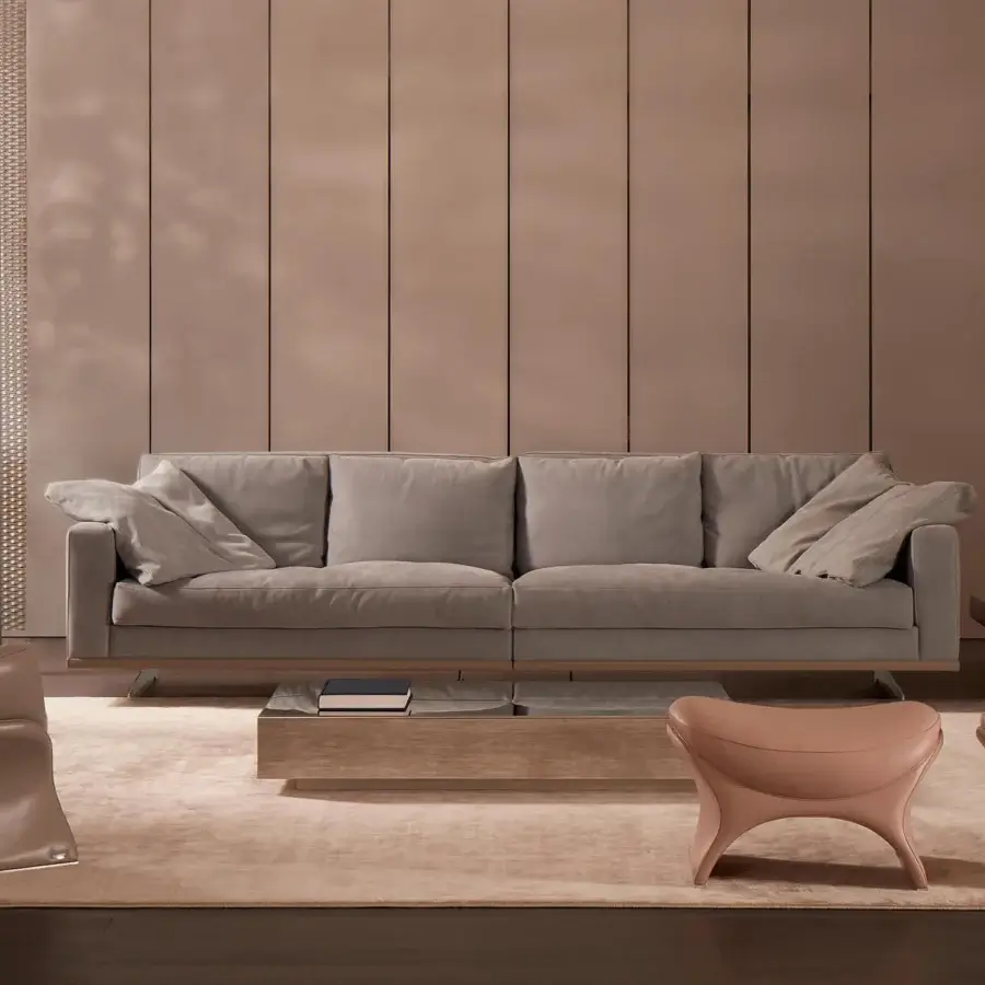 Elegant Mascheroni La Goccia ottoman sculpted in light peach material or leather with authentic branding plate