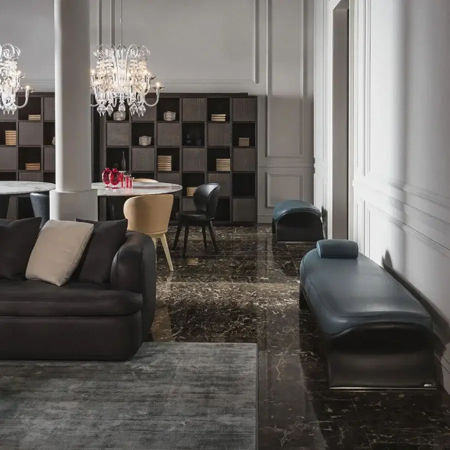 Distinguished Mascheroni La Goccia chaise lounge built with dark blue-grey leather upholstery and a sculpted, curved silhouette