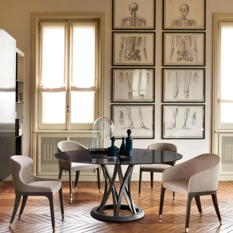 Distinguished Potocco Miura chair with soft curves, a solid beech structure and light beige upholstery with visible stitching and dark stained legs