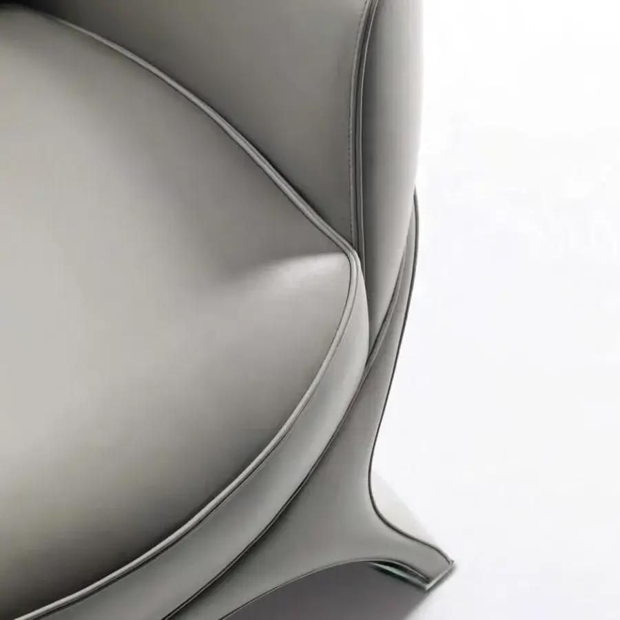 Distinctive Mascheroni La Goccia lounge chair with uniform gray matte leather and curved organic silhouette crafted in Italy