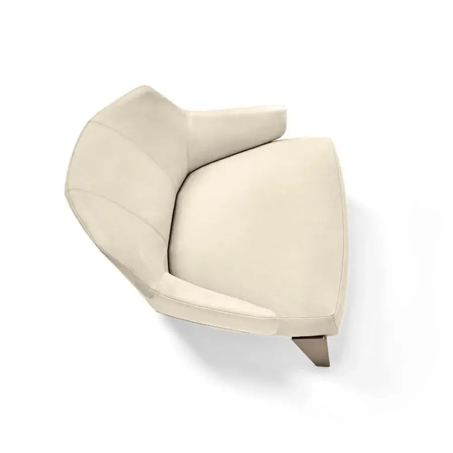 Distinguished Arketipo Nascar lounge chair with swooping lines upholstered in refined off-white fabric and muted gold-toned metal legs