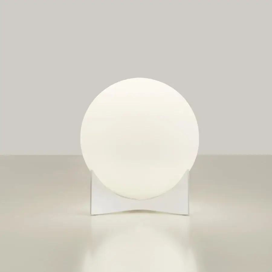 Elegant Terzani Oscar lamp with a white glass orb shade and curved structure in a white finish