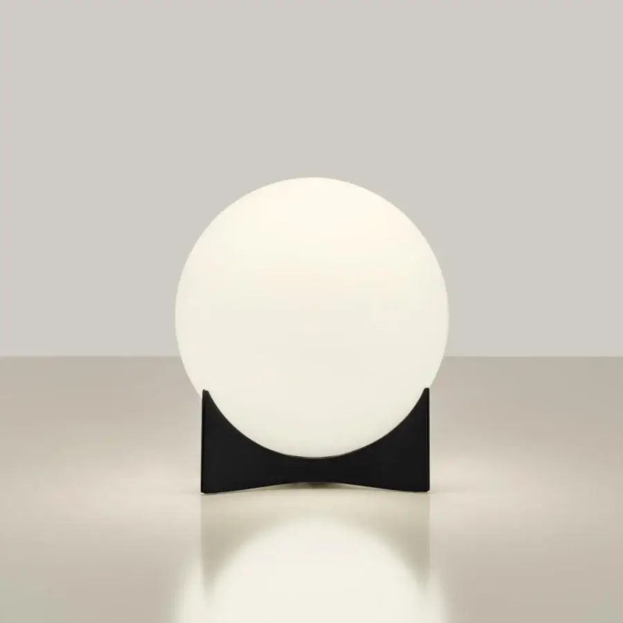 Distinguished Terzani Oscar lamp with a white glass orb delicately held by a curved black metal structure