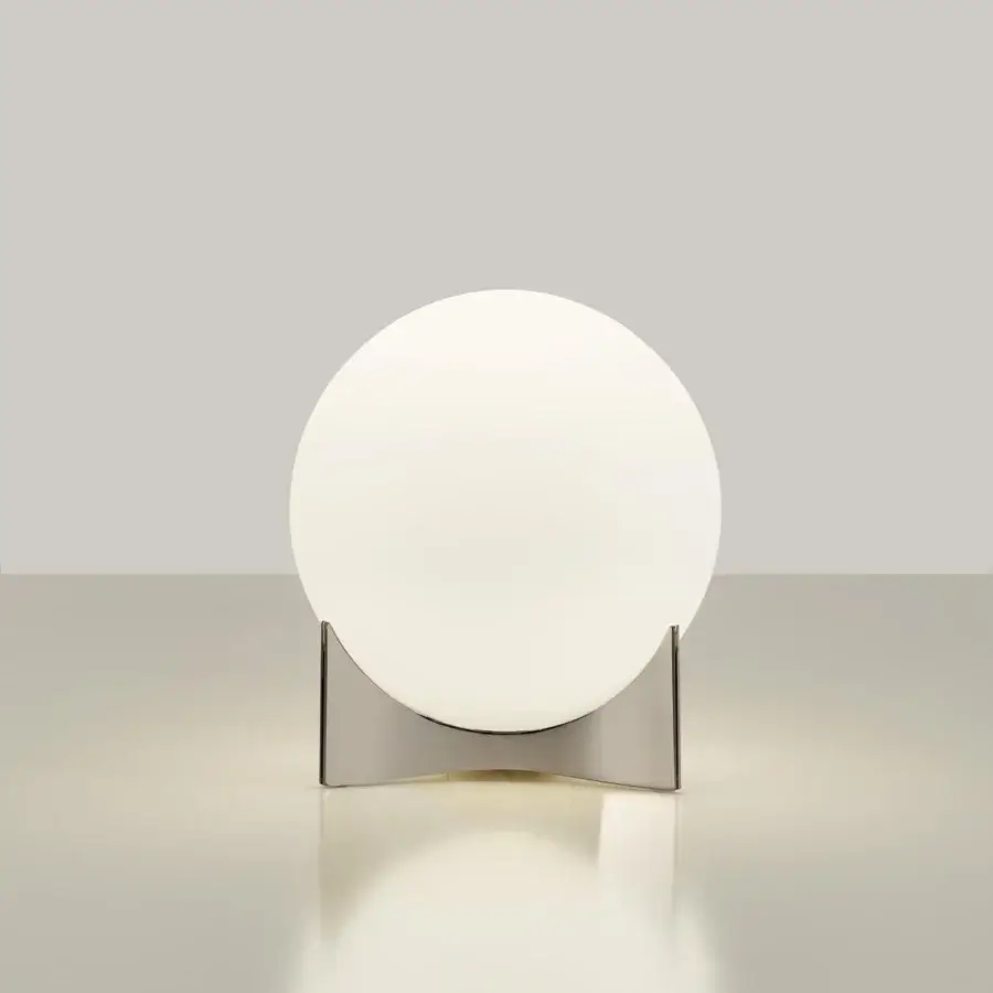 Innovative Terzani Oscar lamp with a luminous white glass orb and curved matte gray metal structure