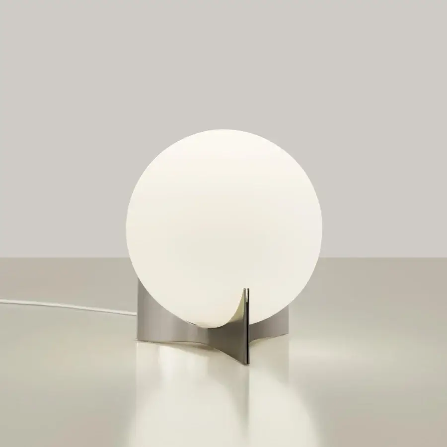 Distinguished Terzani Oscar lamp with a white glass orb diffuser and curved brushed metal base epitomizing minimalist design