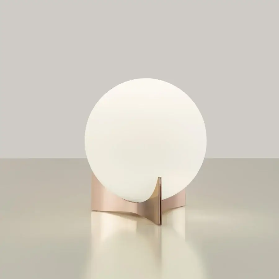 Elegant Terzani Oscar lamp with a luminous white glass orb built within a rose gold metal structure