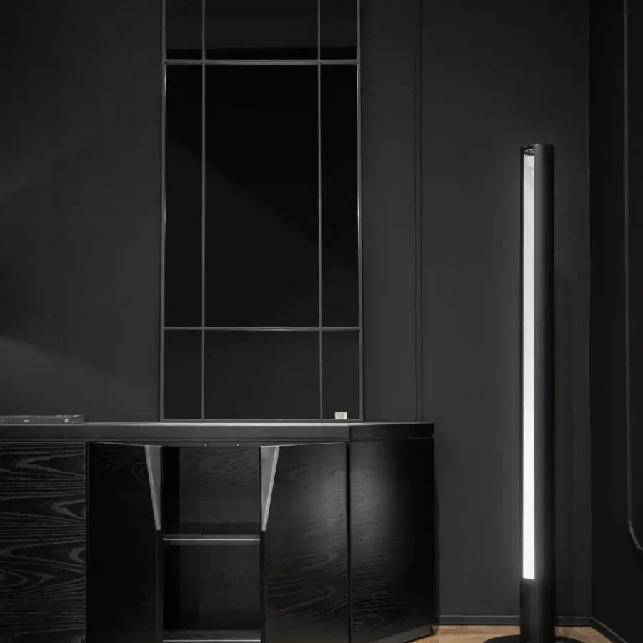 Avant-garde WAYNE Enterprises WE-126 floor lamp with cylindrical form and lacquered dark structure
