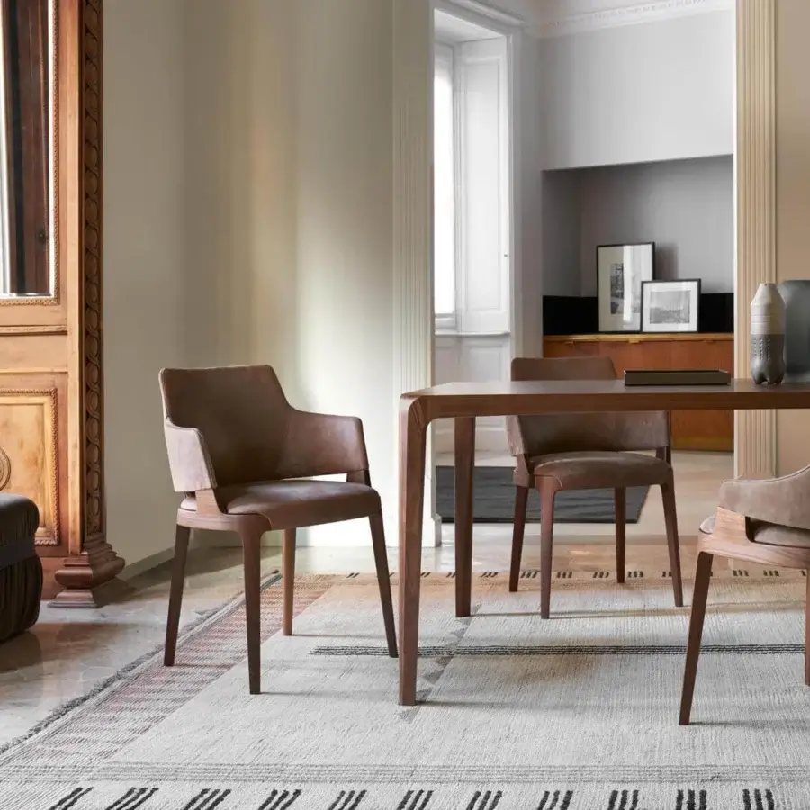 Elegant Potocco Herm indoor ottoman in dark grayish-brown textile upholstery with a matte finish and tailored dark leather belt detail
