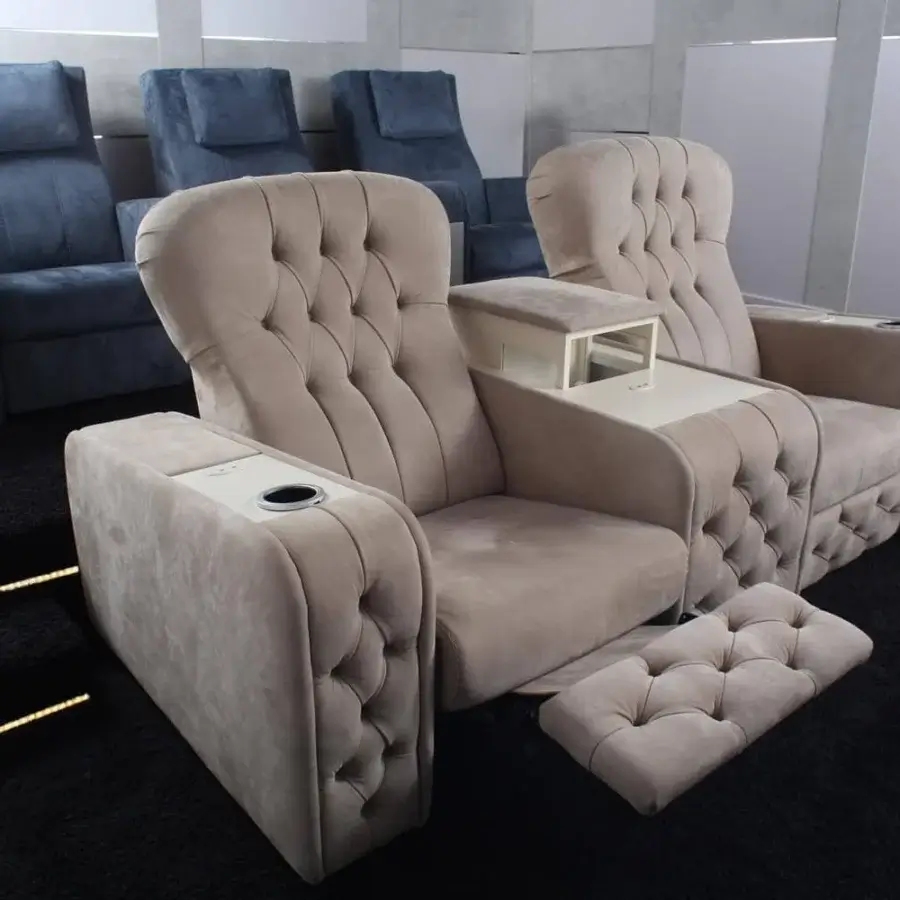 Distinctive Vismara Chest home cinema seating with electric recline and chrome steel cupholders in plush light beige and blue textile with matte finish