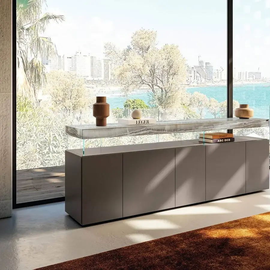 Innovative Lago Air sideboard with transparent tempered glass supports and mesmerizing XGlass top in marble-like pattern, crafted with matte gray cabinets