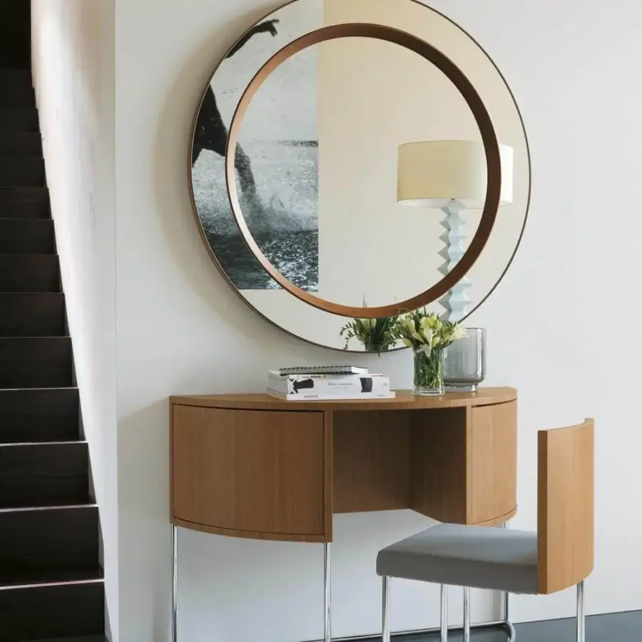 Elegant Porada Miss Tondo vanity with semi-circular form in canaletto walnut and reflective silver-tone metal legs