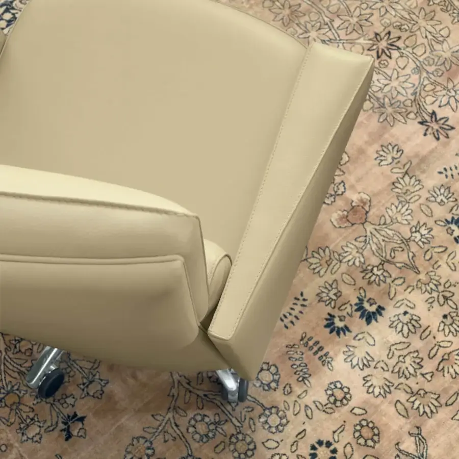 Distinguished Mascheroni Kronos armchair crafted in light beige genuine leather with a smooth finish and steel swivel base