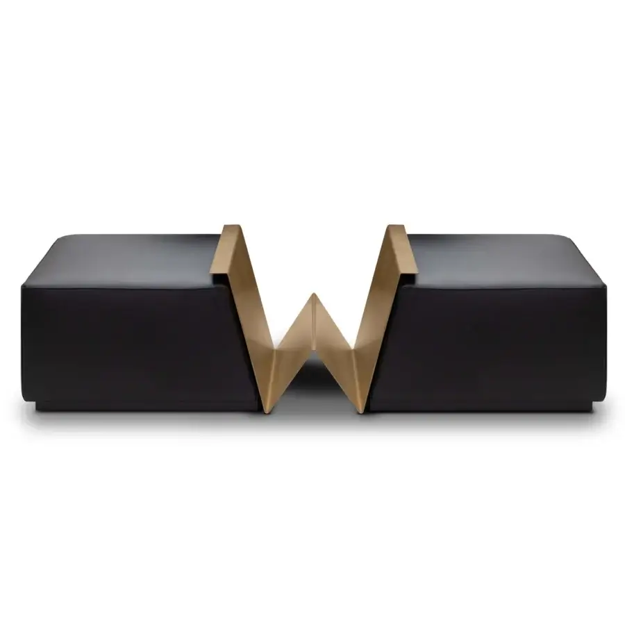 Superior WAYNE Enterprises WE-158 ottoman with black padded sections and golden angular metal support forming a distinctive shape