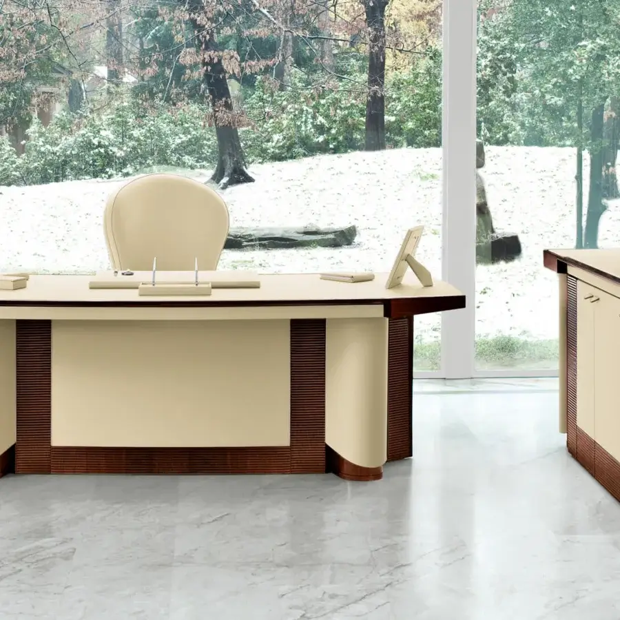 Elegant Mascheroni Polaris armchair in creamy natural leather with a birch shaped wooden structure and steel base