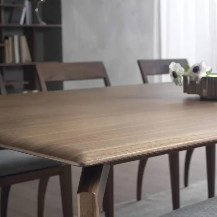Elegant Pacini & Cappellini Hope table crafted in natural brown wood with a unique divided leg design