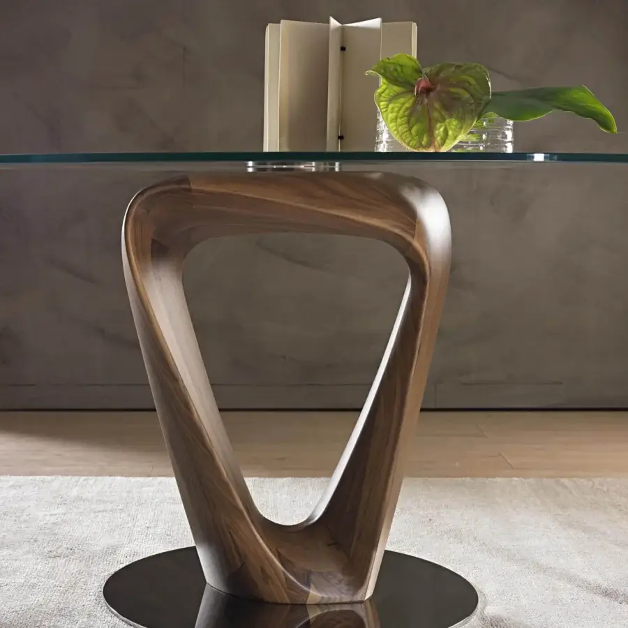 Distinguished Pacini & Cappellini Mobius table with clear tempered glass and a glossy warm brown wooden base built with a chromed metal plate