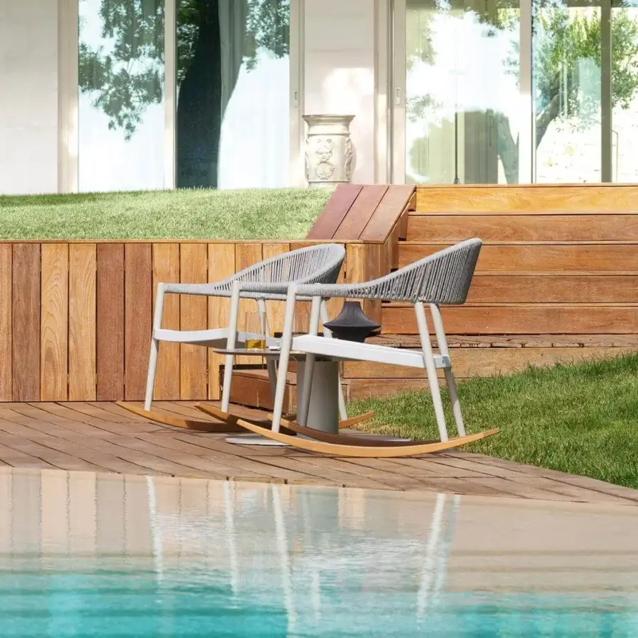 Handcrafted Varaschin Clever rocking lounge chair with grey textile weaving and white powder coated aluminum framing built with natural Iroko runners