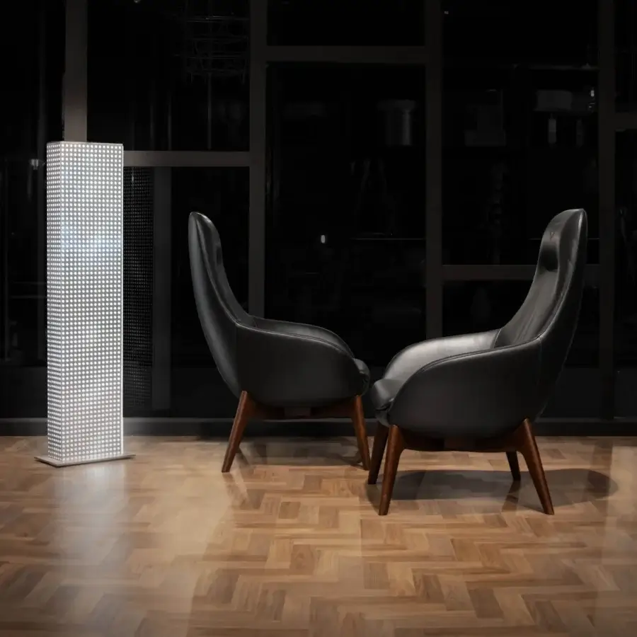 Exclusive WAYNE Enterprises WE-130 lounge chair with dark leather upholstery and rich brown wood base