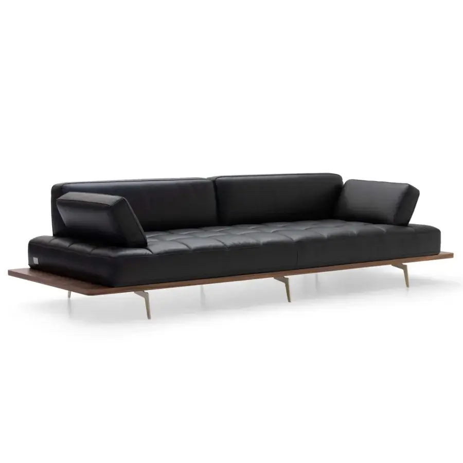 Distinguished Wayne Enterprises WE-029 sofa in quilted black upholstery with a wood veneer base and sleek metal feet
