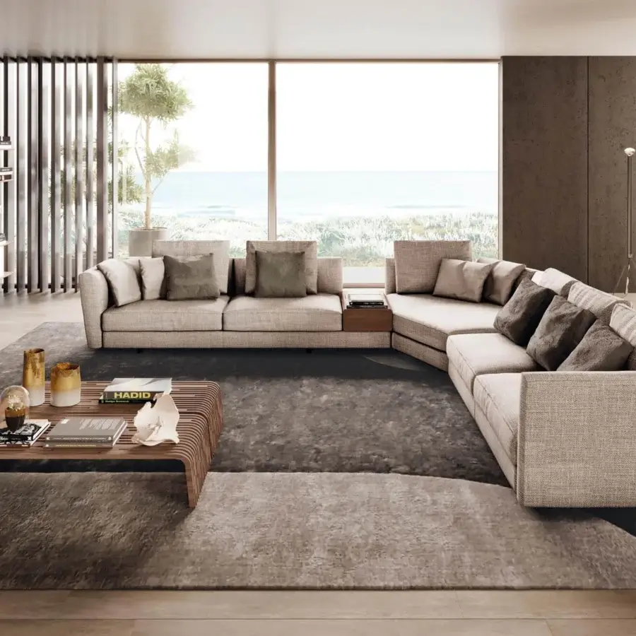 Distinguished Pacini & Cappellini Ester sectional upholstered in light beige woven fabric with a raised wooden base