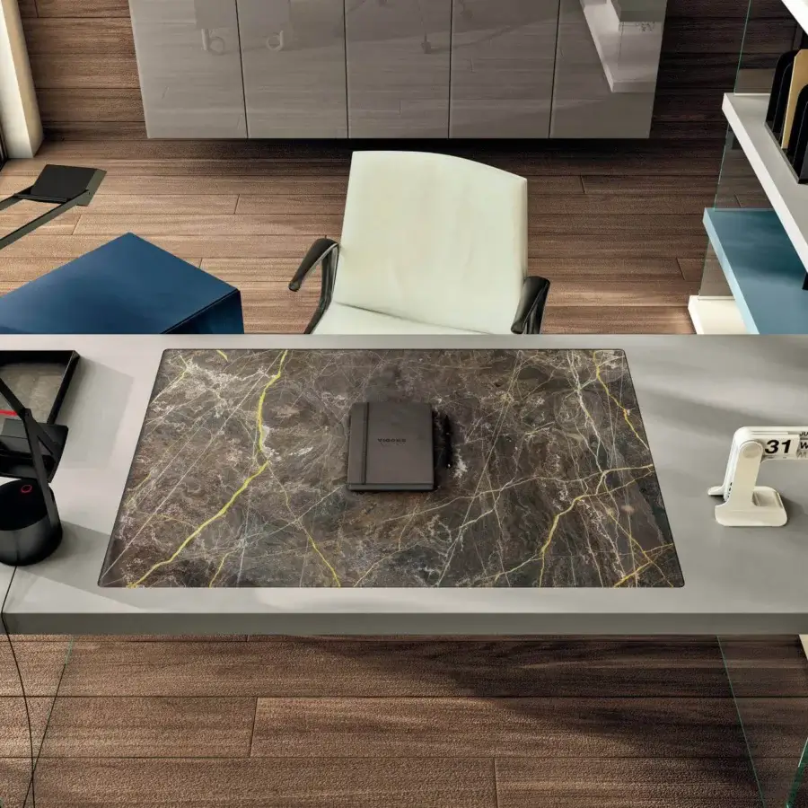 Distinguished Lago Air desk with light gray surface and Wildwood marbled finish, built with a transparent tempered-glass base
