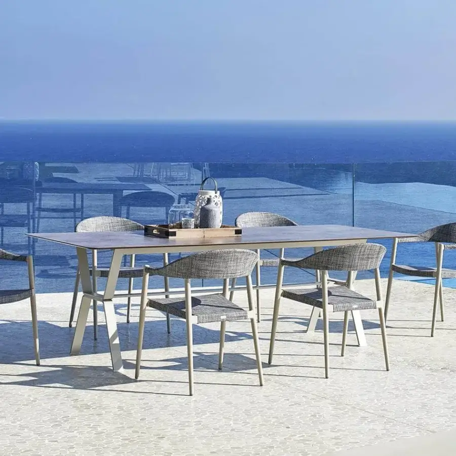 Exceptional Varaschin Clever armchair with a powder-coated aluminum frame and VAR#TEX fabric in a muted grey hue