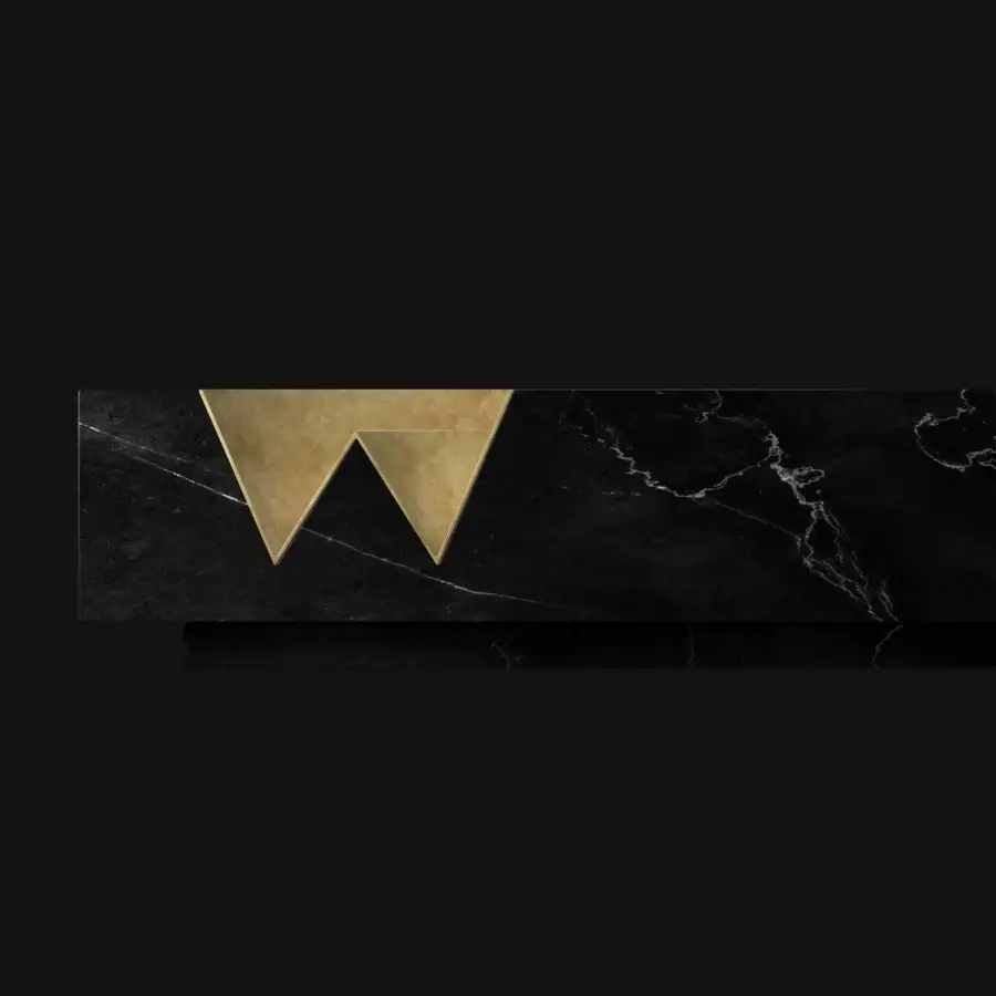 Distinguished Wayne Enterprises WE-004 coffee table built in dark marble with white veining and inlaid gold design