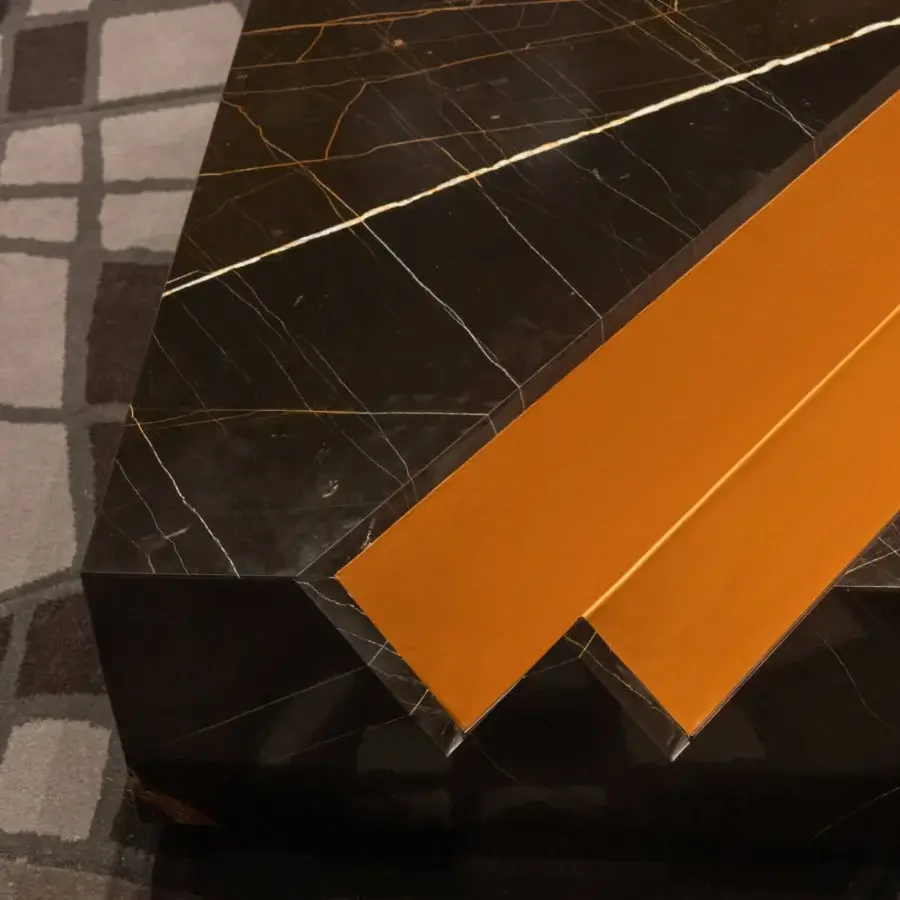 Superior WAYNE Enterprises WE-004 coffee table with a geometric design in lacquered golden-brown and inlaid leather bearing OFFICIAL BATMAN and DC COMICS logos