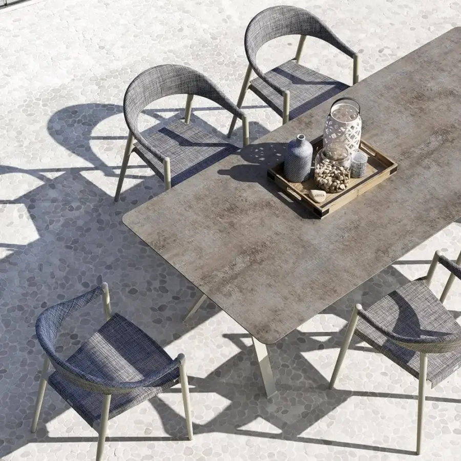 Sophisticated Varaschin Clever armchair with a powder-coated aluminum frame and VAR#TEX woven seat in a dark blue-grey hue