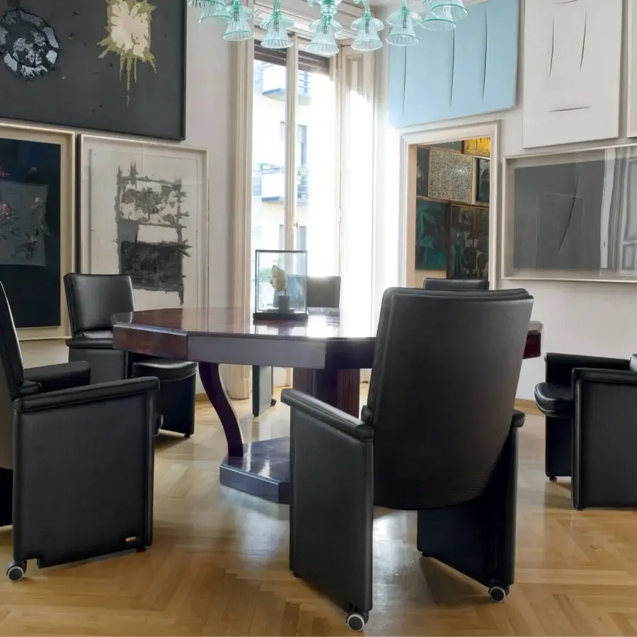 Distinguished Mascheroni Cult V armchair upholstered in black textured synthetic material with a matte finish and curved birch wood frame