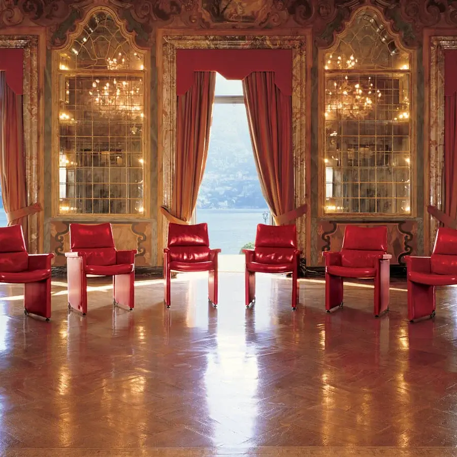Distinguished Mascheroni Tripla A V armchair crafted with vibrant red natural leather and curved birch wood construction