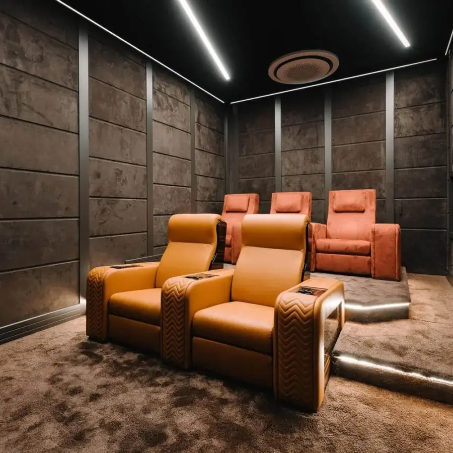 Distinctive Vismara Onassis Home Cinema seating upholstered in Coconut Milk leather with zigzag armrests and Art Déco design