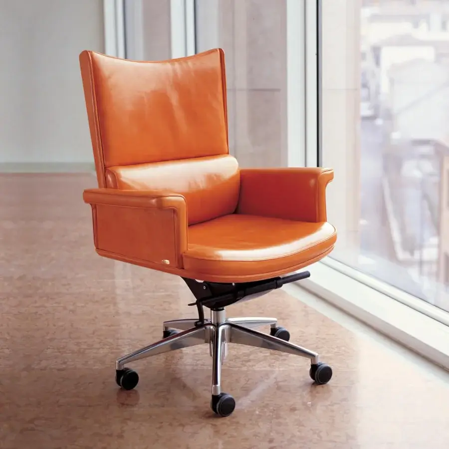 Exceptional Mascheroni Planet armchair in vibrant orange natural leather with birch shaped wood and rotating steel base