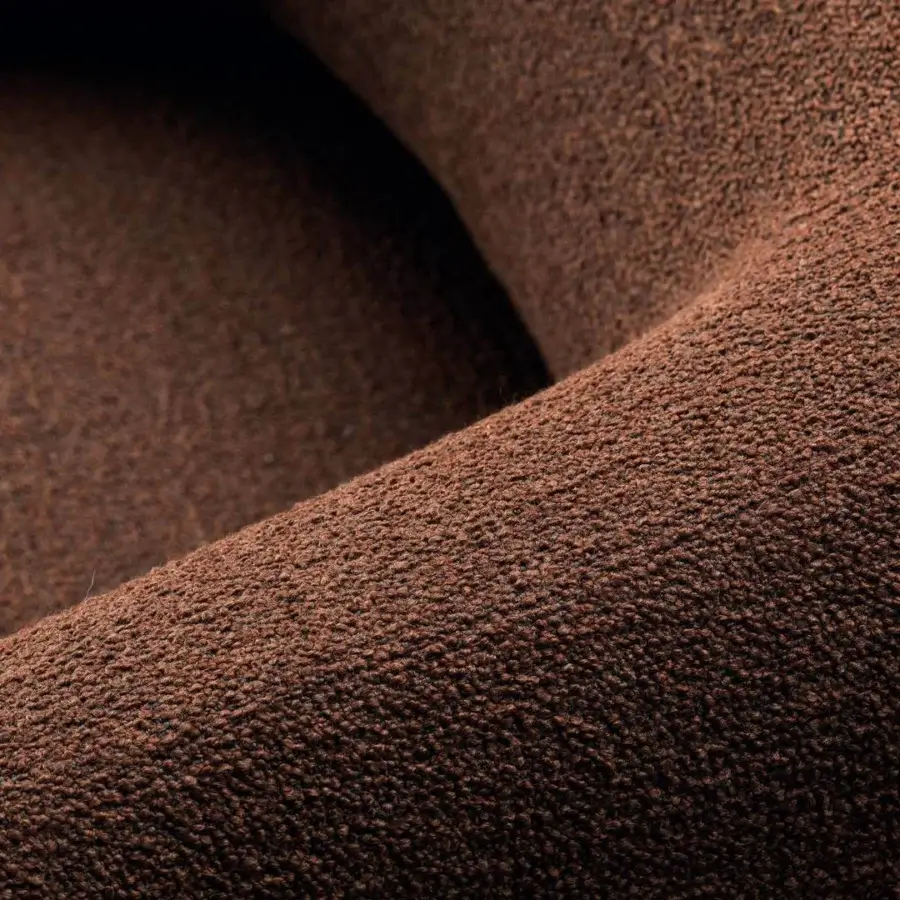 Distinctive Lago Zeppelin lounge chair with textured matte brown textile upholstery and a swivel return mechanism